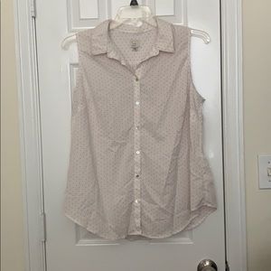 Sleeveless polka dotted blouse
